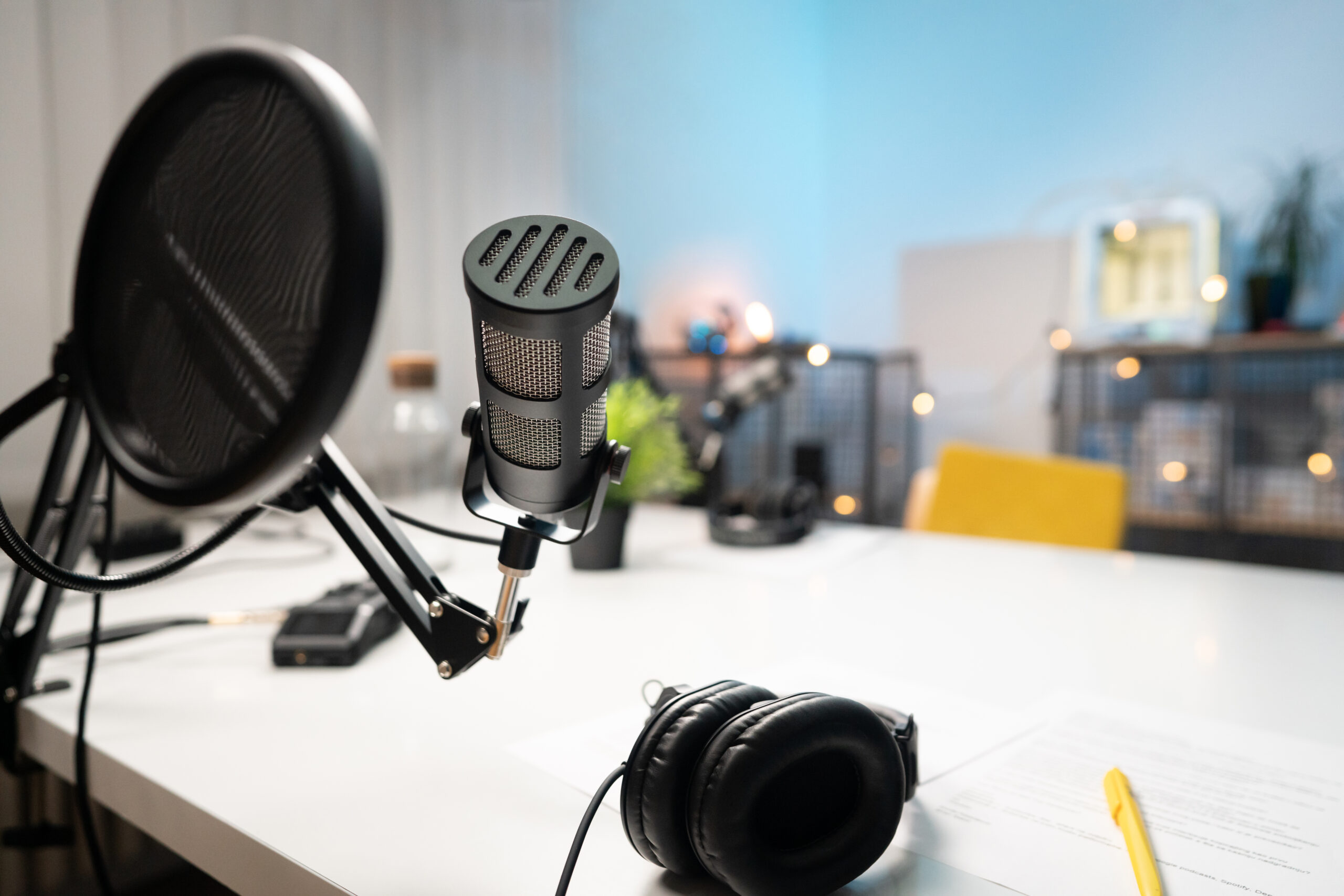 Headphones and a microphone in a recording studio